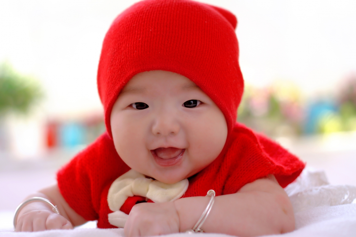 Wearing a red hat = cute baby