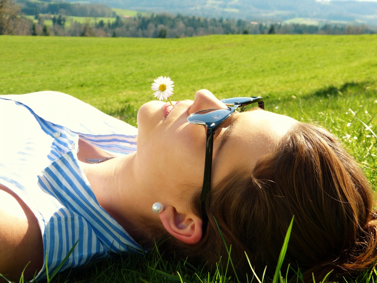 Girl resting on the grass 4