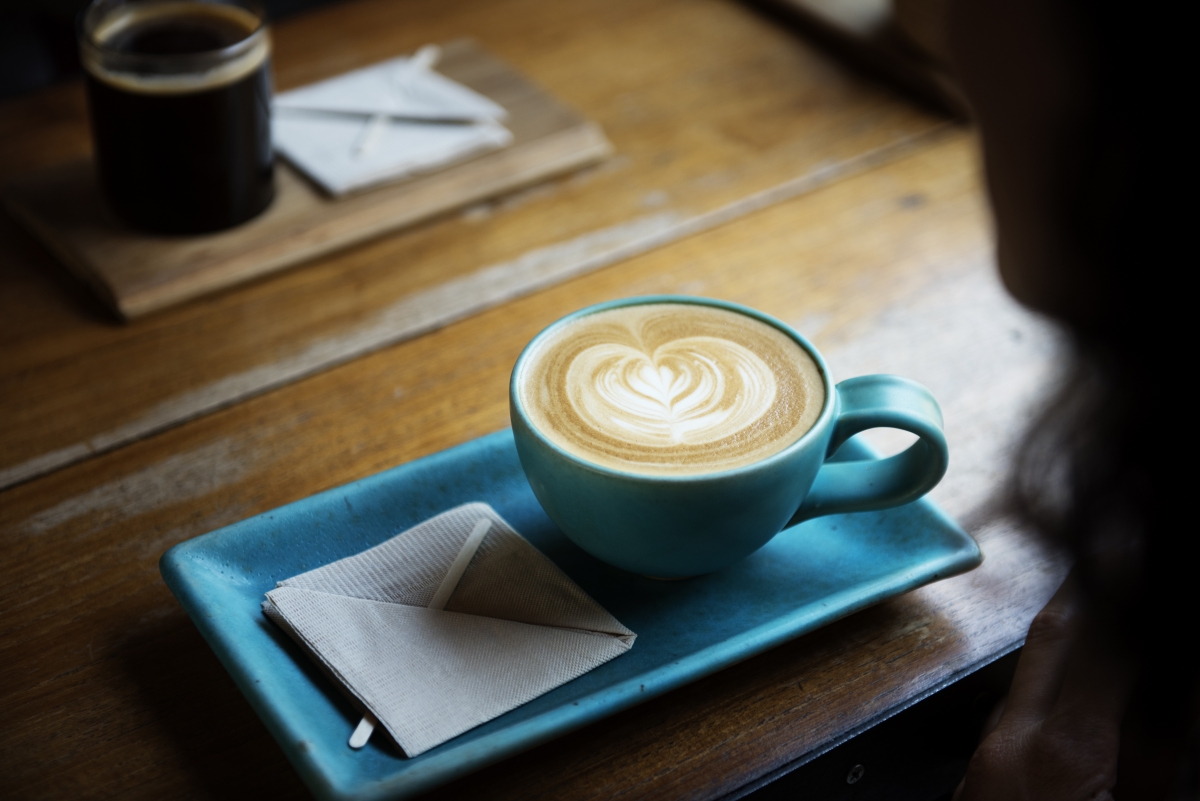 Woman drinking coffee in cafe