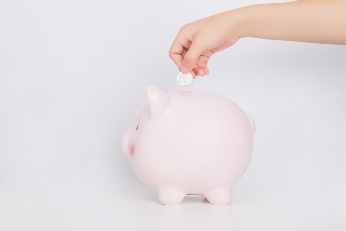 Save money in a piggy bank