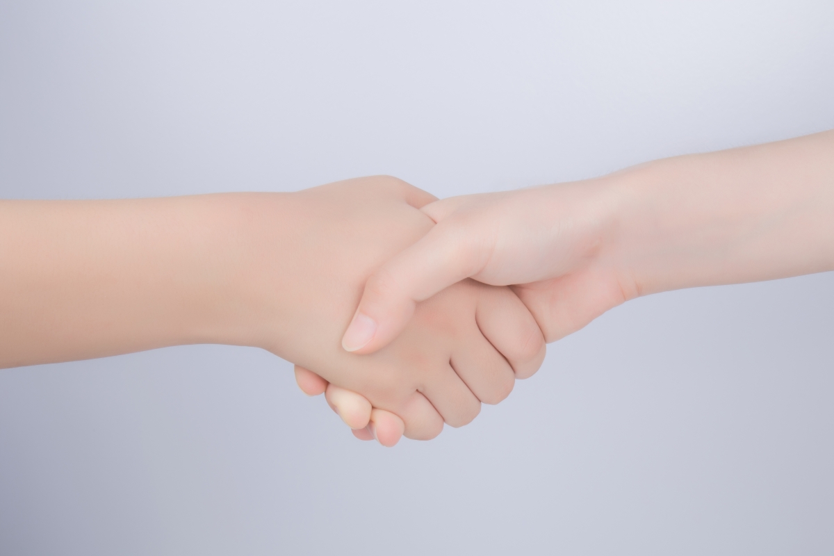 Team handshake business cooperation pictures
