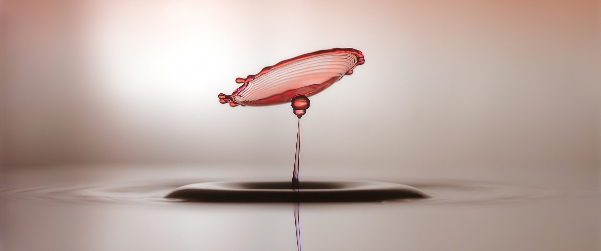Close-up shot of water drop collision 3440