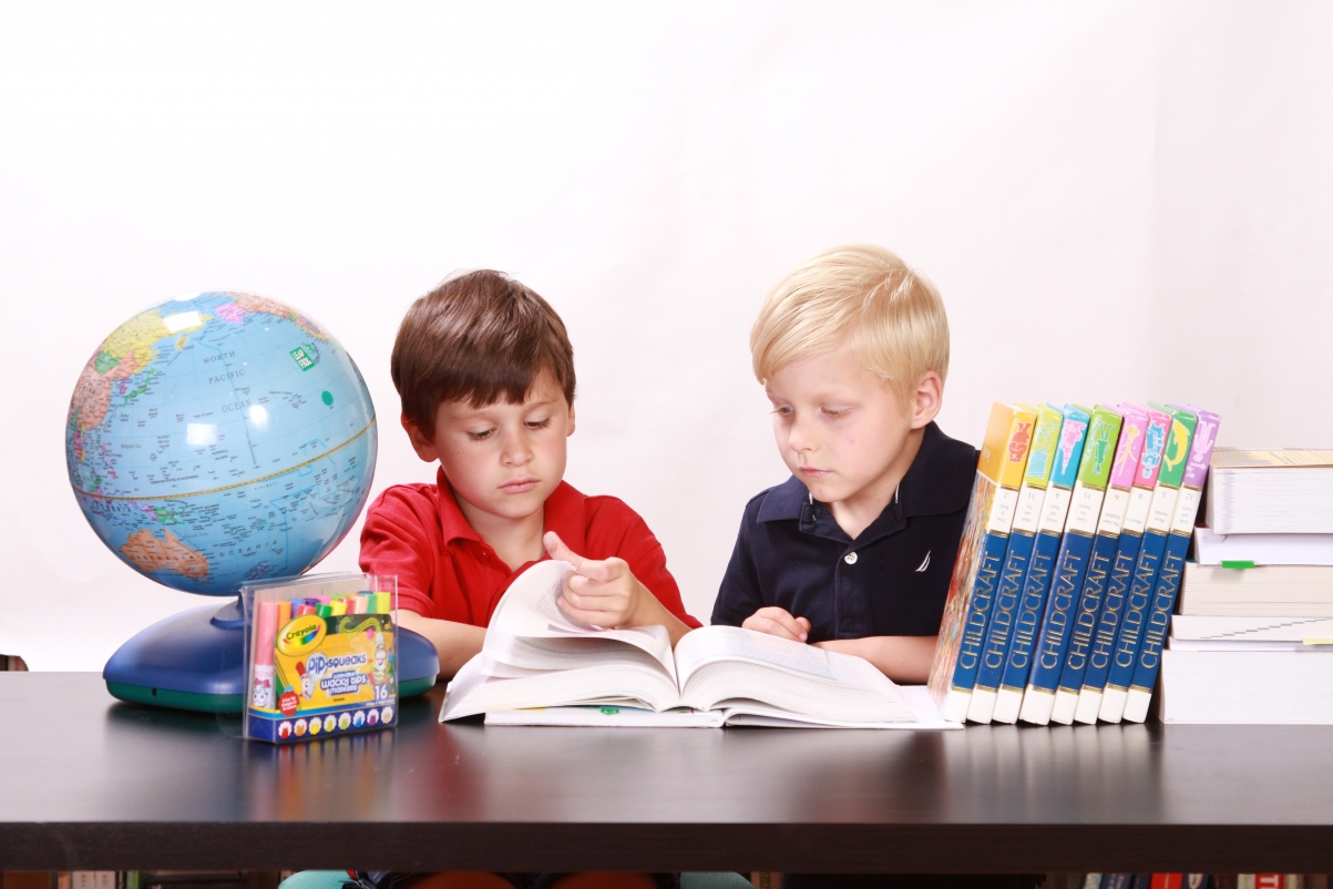 Two students are reading and studying carefully