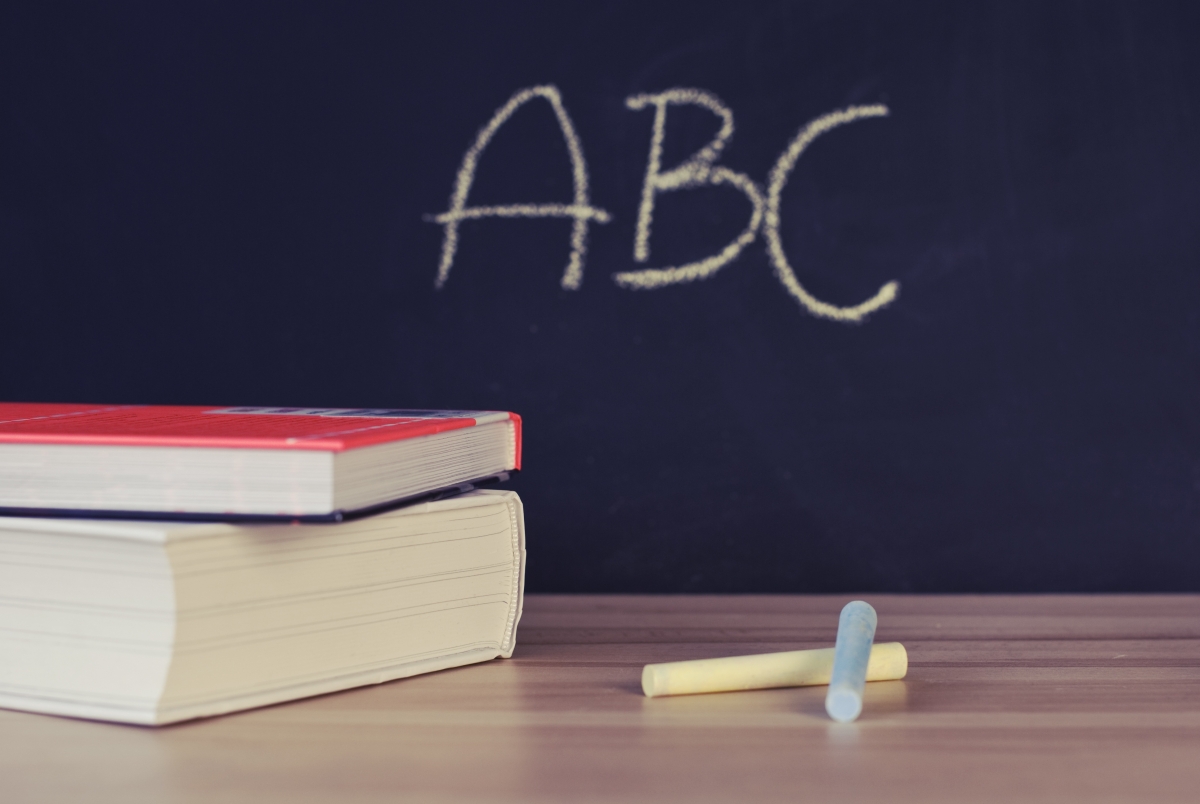 The place where the teacher teaches the students is black
