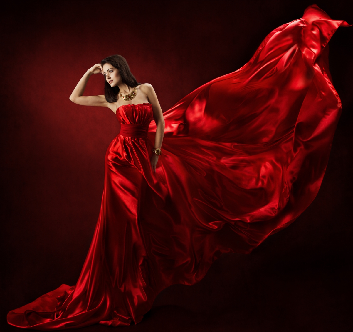 Beautiful silk woman in red dress