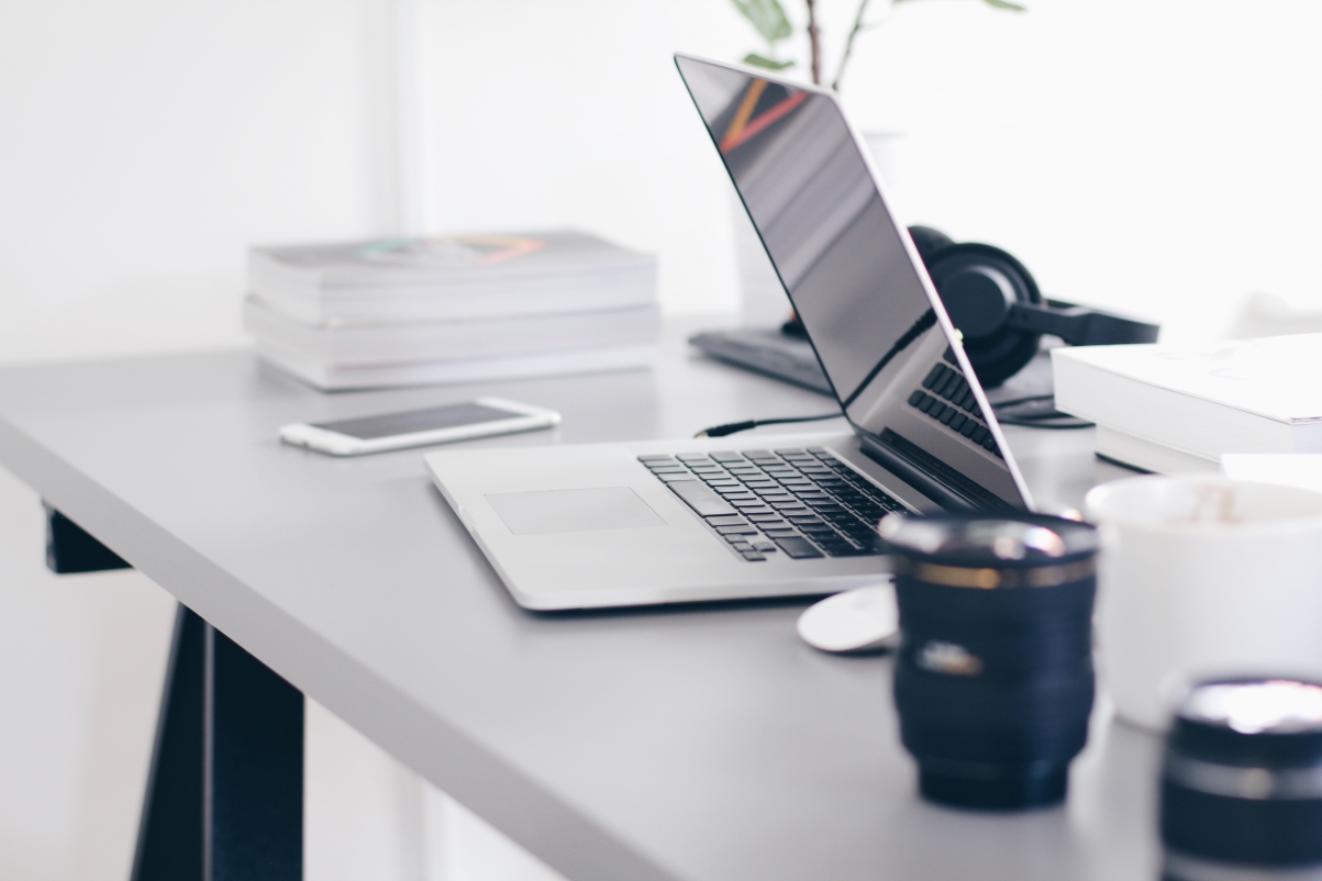 Laptop cup and notebook