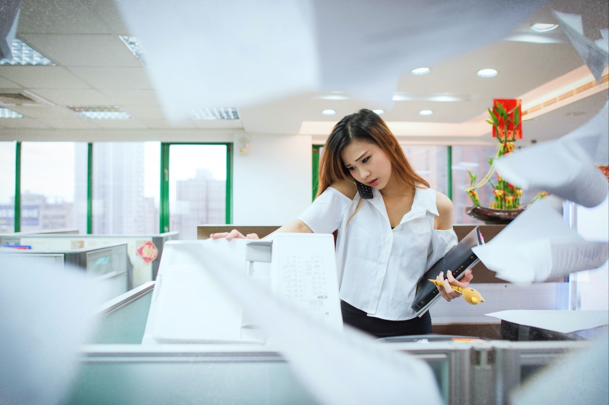 Busy woman in office
